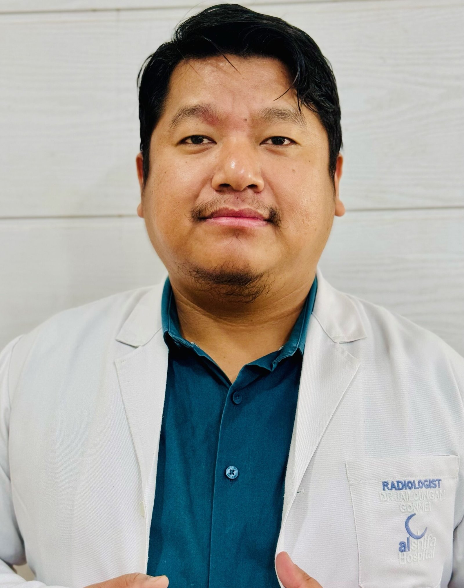Dr. Jailoungam Gonmei
